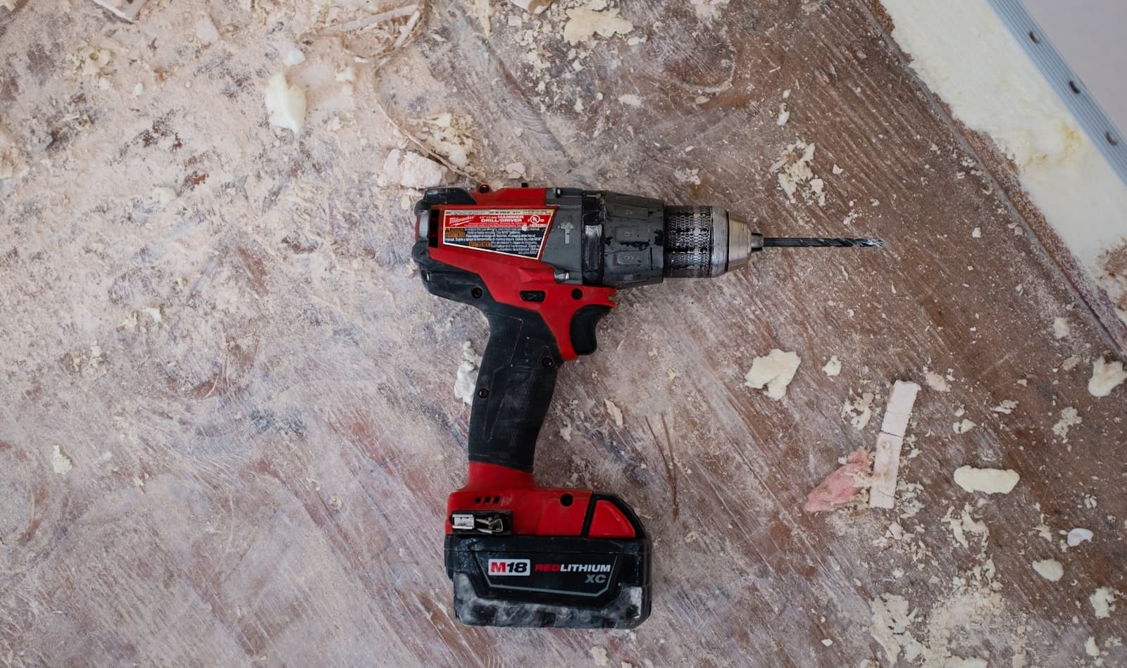 Craftsperson at work with tools in a small workshop